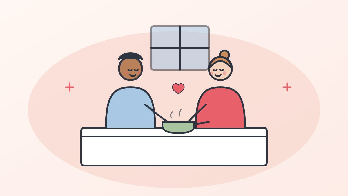 Young man cooking a meal with his support worker in his supported living kitchen